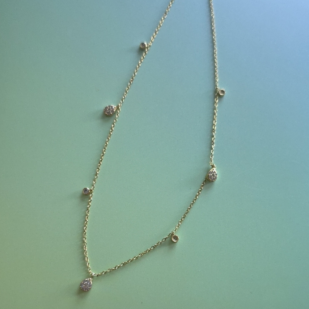 Elegant Gold Tone Necklace with Crystal Accents